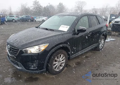 2016 Mazda Cx-5 Touring z USA, uszkodzony, nr VIN JM3KE2CYXG0896509